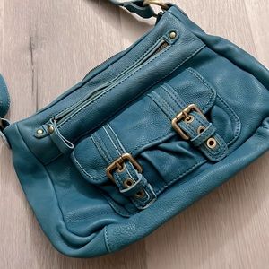 Turquoise leather handbag